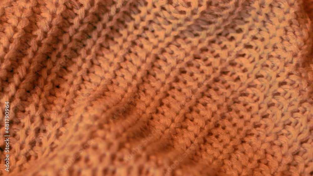 Orange Knitted Fabric Texture, Yarn, Knitted Material, Cozy Warm Textile, Plaid, Sweater, Clothes, Bedspread. Abstract Orange Background. Garment Factory, Textile Fabric Production. Orange Knitted Fabric Texture, Yarn, Knitted Material, Cozy Warm Textile, Plaid, Sweater, Clothes, Bedspread. Abstract Orange Background. Garment Factory, Textile Fabric Production.