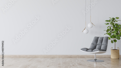 Stanza vuota con poltrona e lampade di design photo