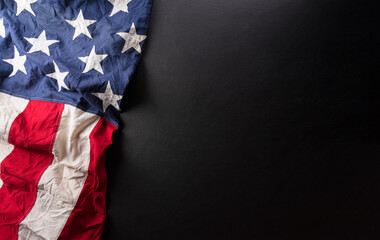 Happy presidents day concept with flag of the United States on dark  background.
