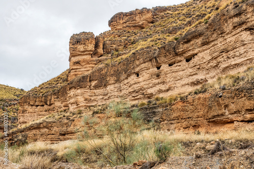 Ridges and cliffs of the Badland de los Coloraos in the Geopark of Granada photo