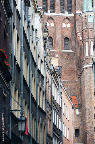 POLAND, GDANSK: Scenic cityscape view of city old center with traditional colorful architecture and red cathedral