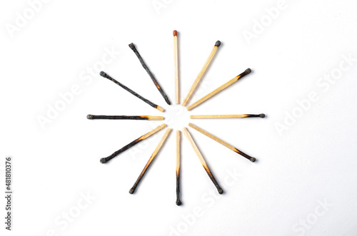 Burnt matches on a white background. The concept of burnout syndrome at work