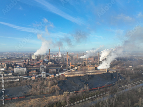 Factory metal steel processing hot, drone aerial video shot, smoke chimneys rises black poison, smog in city Ostrava, dust in air, quadcopter view flying fly flight show, danger human health