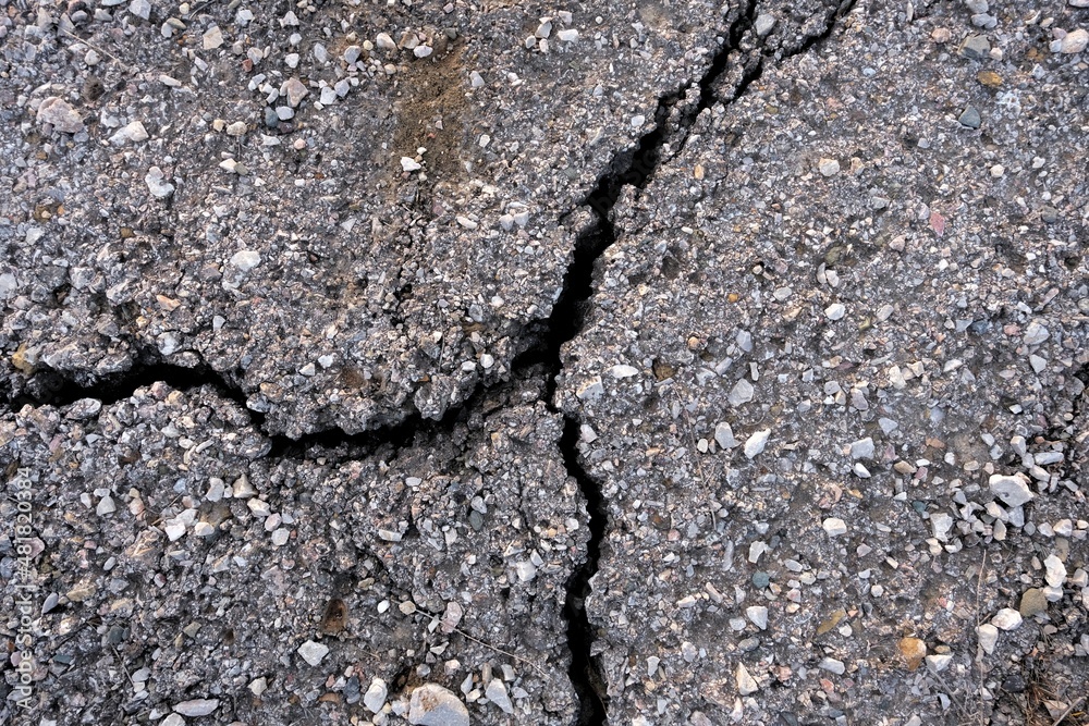 Cracks in the asphalt road. Cracks in the asphalt road.