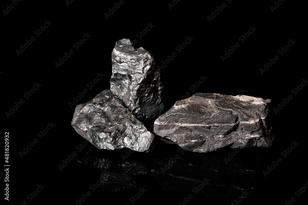 Macro Close up image of raw material Manganese Ore rock isolated Macro Close up image of raw material Manganese Ore rock isolated