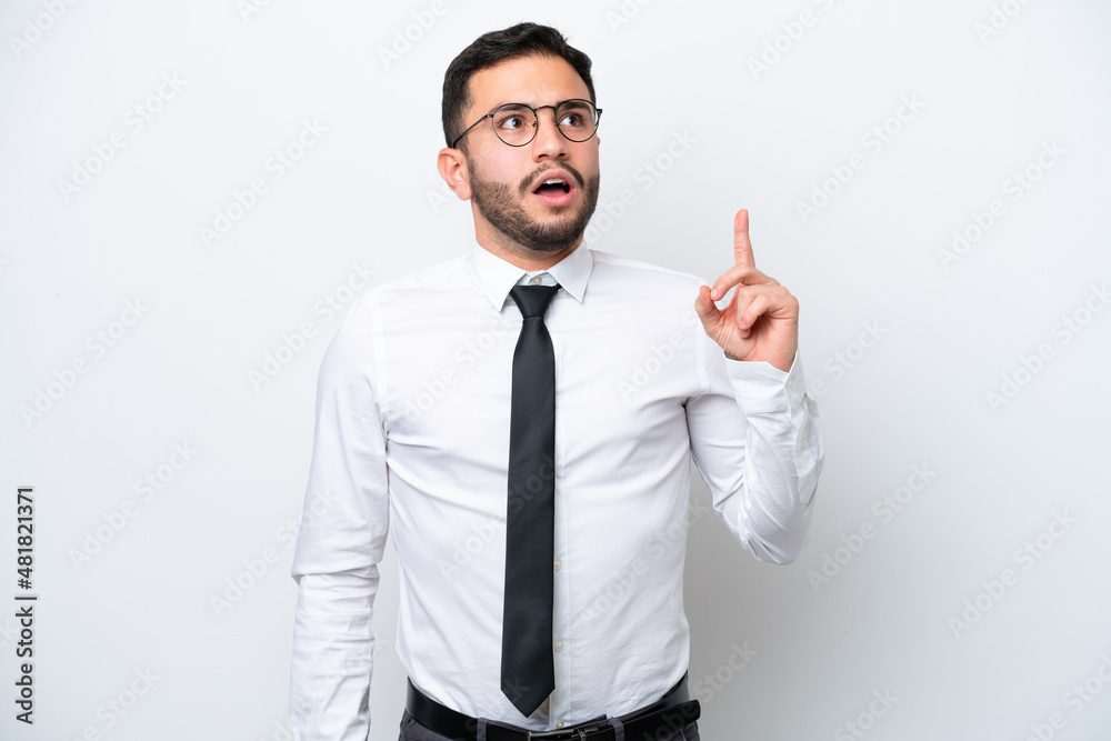Business Brazilian man isolated on white background thinking an idea pointing the finger up Business Brazilian man isolated on white background thinking an idea pointing the finger up