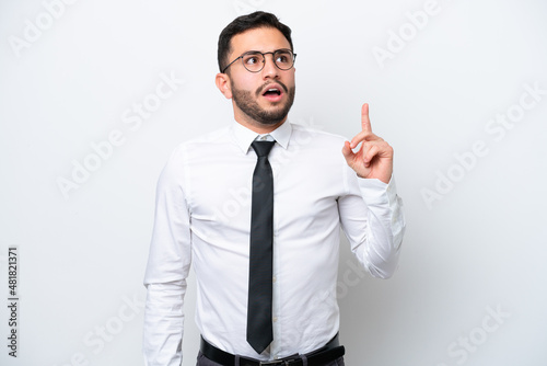 Business Brazilian man isolated on white background thinking an idea pointing the finger up