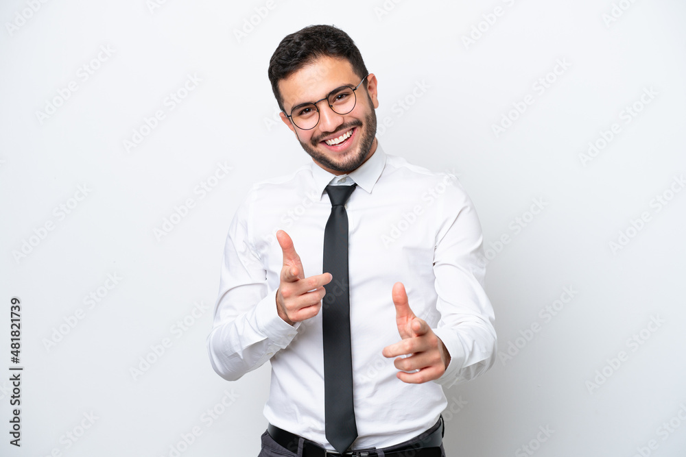 Business Brazilian man isolated on white background pointing to the front and smiling Business Brazilian man isolated on white background pointing to the front and smiling