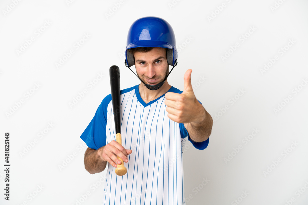 Young caucasian man playing baseball isolated on white background with thumbs up because something good has happened Young caucasian man playing baseball isolated on white background with thumbs up because something good has happened