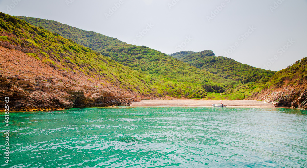 Naklejka premium Corfu, Greece sea coast and rocks
