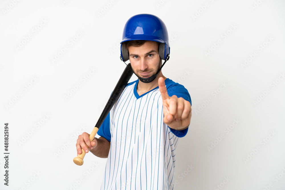 Young caucasian man playing baseball isolated on white background showing and lifting a finger Young caucasian man playing baseball isolated on white background showing and lifting a finger