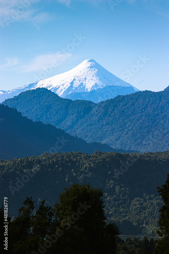 View of the Osorno volcano behind the mountains