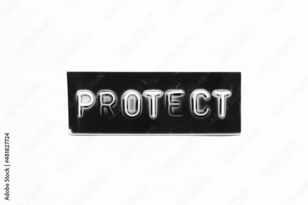 Black color banner that have embossed letter with word protect on white paper background
