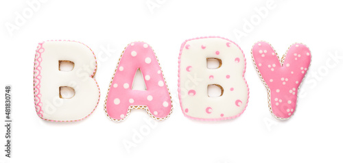 Word BABY made of tasty cookies on white background, top view