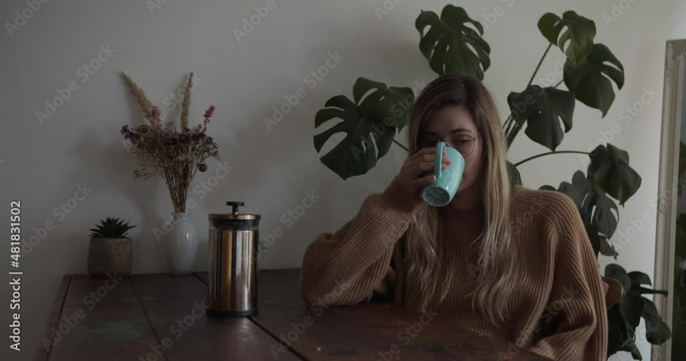 Girl drinks her coffee in the morning