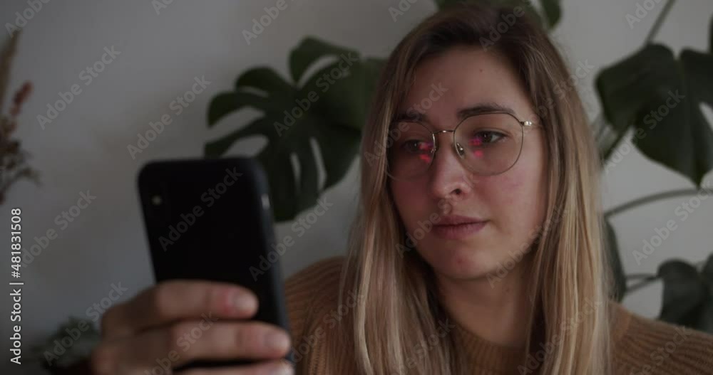 Girl sees something funny on her smartphone