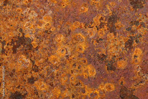 A close-up of rusting metal on a junkyard
