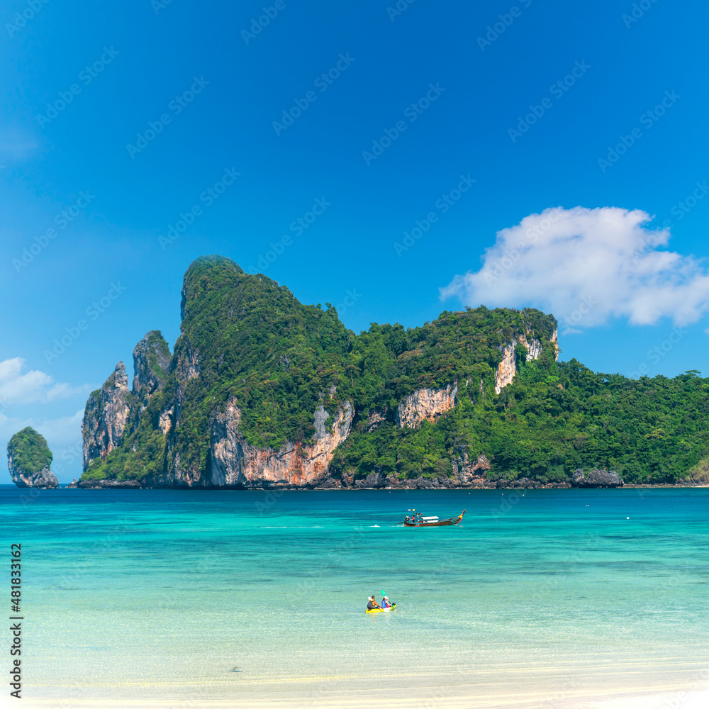 Tropical Turquoise clear blue sea and white sand beach at Loh Dalum Beach on Phi Phi Islands, Krabi , Thailand., Summer vacation travel at Beautiful Andaman sea.