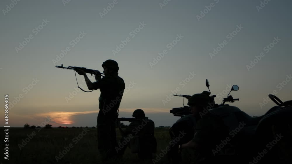 Side view of special forces snipers with large caliber rifle seeking enemy. Side view of special forces snipers with large caliber rifle seeking enemy.