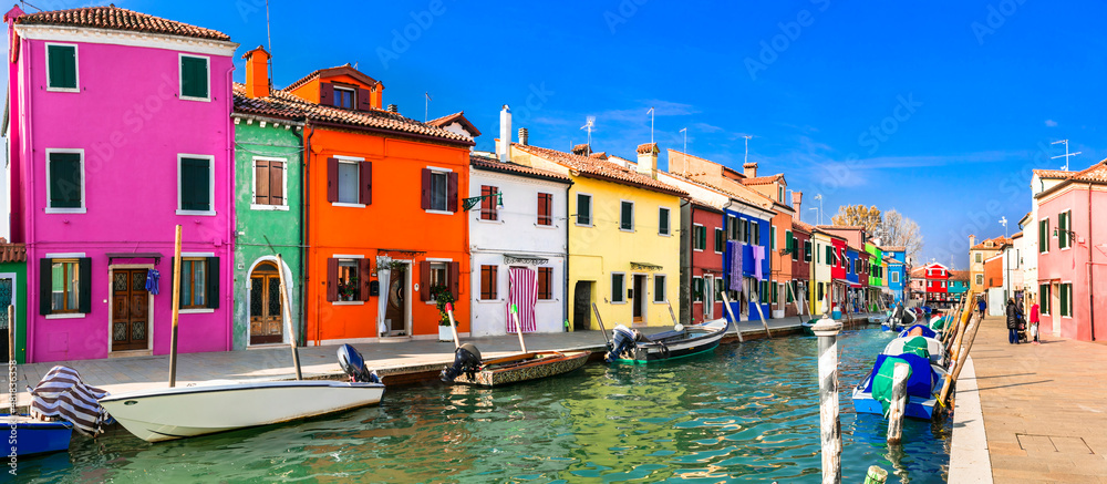 Most colorful places (towns) - Burano island, village with vivid houses near Venice, Italy travel and landmarks - obrazy, fototapety, plakaty 