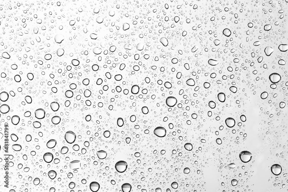 Water drops on car glass. Rain drops on the clear window.