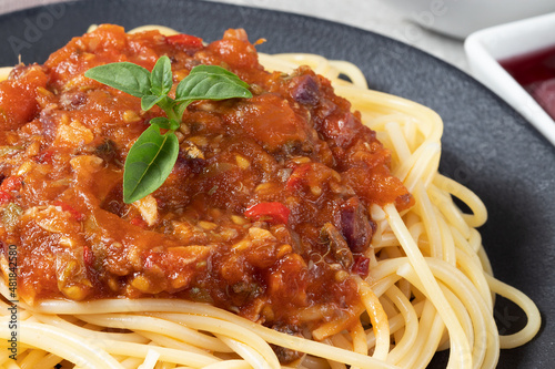 Close up of putanesca spaghetti, selective focus.