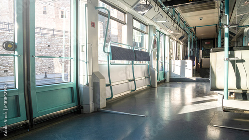 interior of an empty tram traveling photo