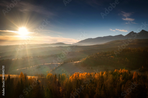 Beautiful sunrise on the meadow under the Tatra Mountains at autumn. Poland