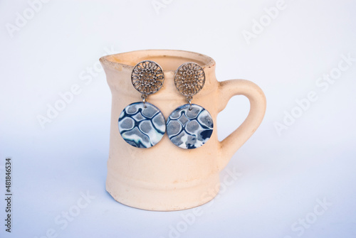 Silver blue winter earrings of polymer clay. Handmde jewelry. photo