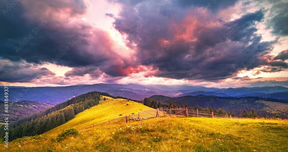 Sunset over Hoverla (goverla), Chornohora ridge, time laps of rapidly flying red clouds over the highest peak of Ukraine, 2061 meters. Time lapse accelerated video, cloud and light dynamics.