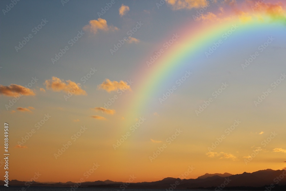 Rainbow in the sky at sunset Auckland New Zealand