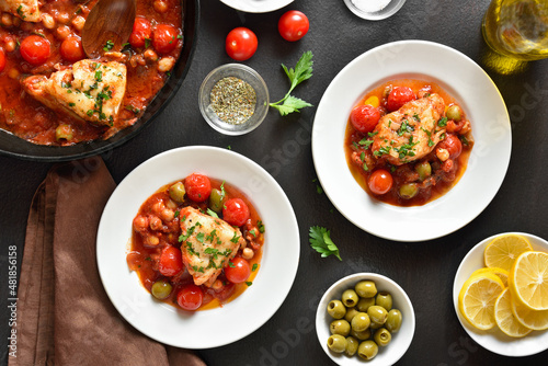 Cod stew with chickpeas, cherry tomatoes and olives