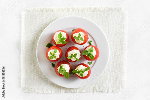 Tomatoes stuffed with cream cheese