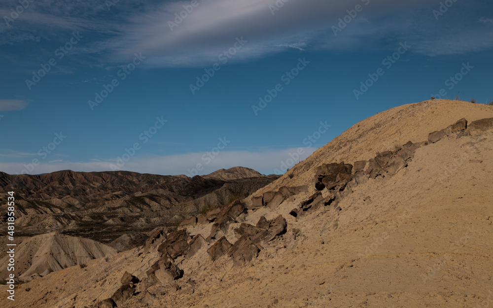 Landscape of Tabernas Desert, Almeria, Spain, against cloudy sky