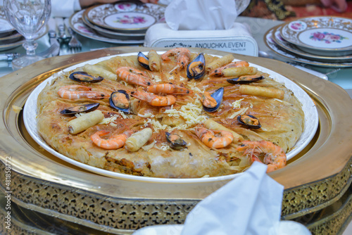 Fresh baked Moroccan fish pastilla