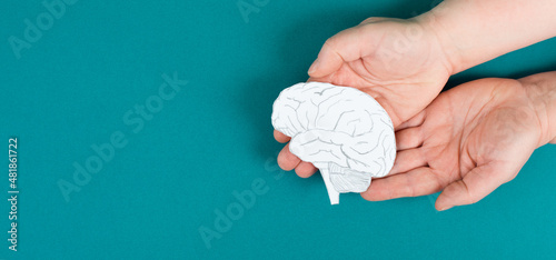 Holding a brain in the hands, Parkinson disease, Alzheimer awardness, mental disorder dementia, psychology problems, cerebral vein thrombosis photo