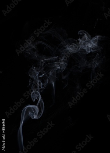 Fototapeta Naklejka Na Ścianę i Meble -  Abstract smoke backgrounds steam of white smoke overlay effect on black wallpaper.