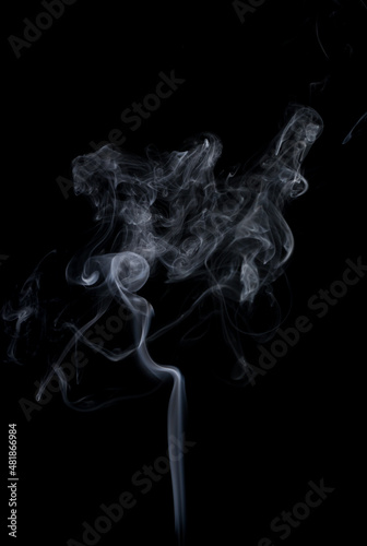 Movement of smoke on black background, smoke background, abstract smoke.