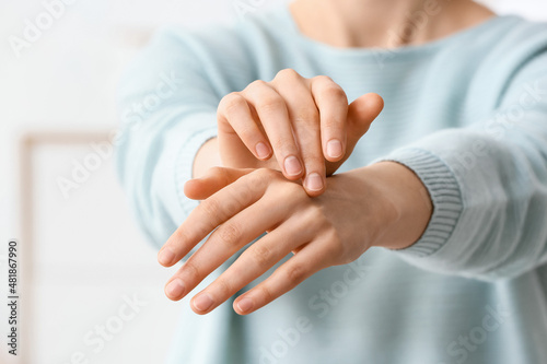 Fotografie Hands of beautiful young woman at home, closeup