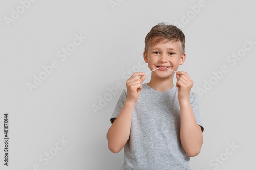 Little boy in grey t-shirt ...