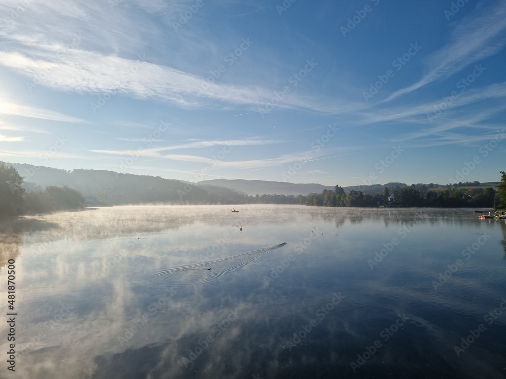 Early morning mist over the first basin of the Sorpesee (Sorpe lake), Sauerland, North Rhine-Westphalia, Germany, on a cold sunny day in October