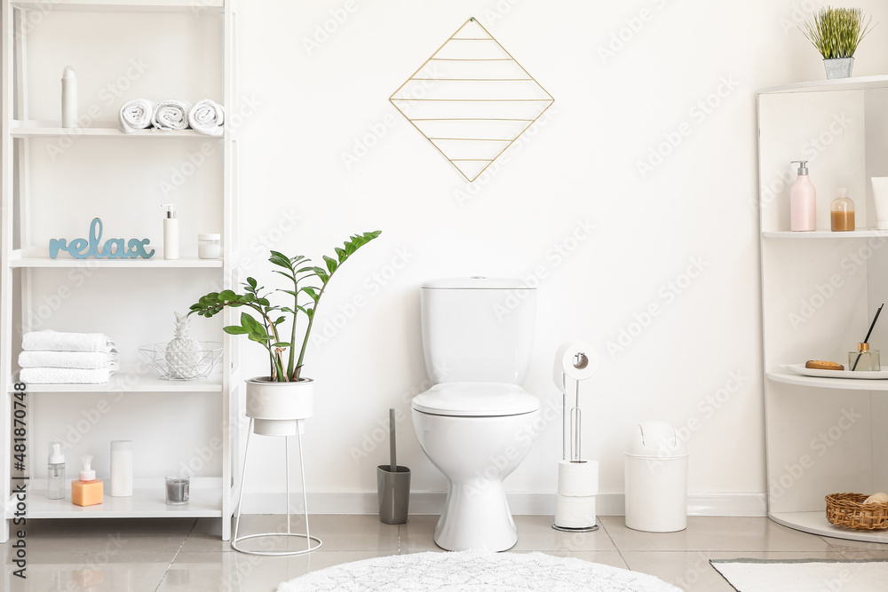 Interior of stylish modern restroom with toilet bowl Stock Photo ...