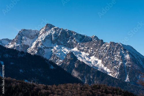 Blick auf Watzmann Massiv im Winter  bei Sonne udn Schnee mit Wind photo