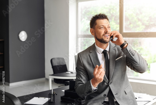 Smiling young businessman t...