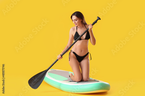 Young woman with board for ...