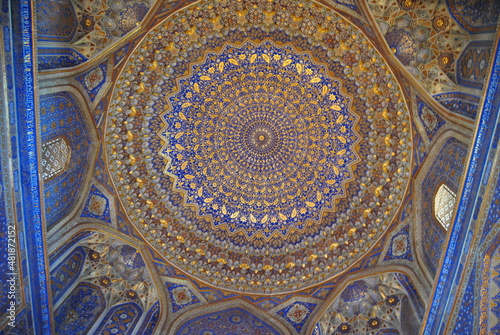 The inner part of the Samarkand mosque. The decoration of the mosque. The interior of the madrasah. Uzbekistan.