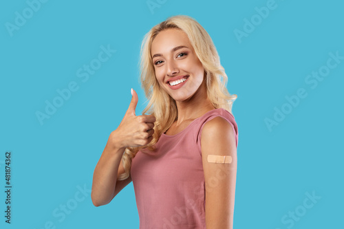 Εκτύπωση καμβά Happy Vaccinated Woman Showing Adhesive Bandage After Vaccine