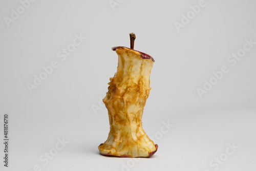 Rotten apple in white background, close up