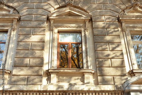 Window of beautiful old building on city street