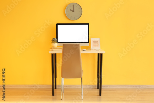 Workplace with modern compu...